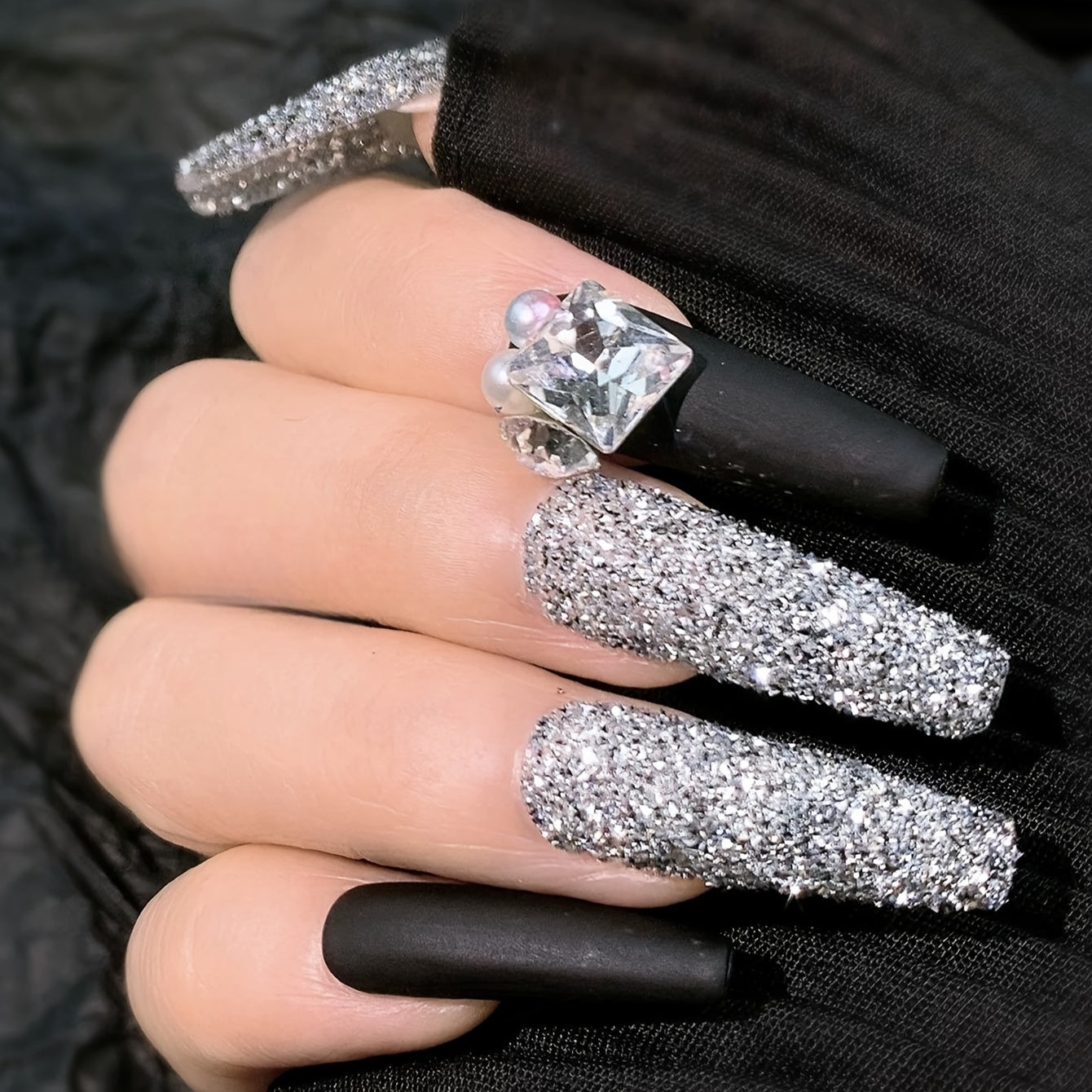 A Box of Tiny Silvery Triangular 3D Glittering Rhinestones, Perfect for Parties, Nightclubs, Music Festivals, And Vacation Nail Art Accessories.